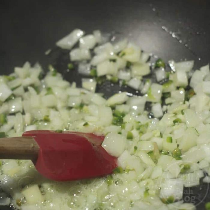onions and green chili cooking
