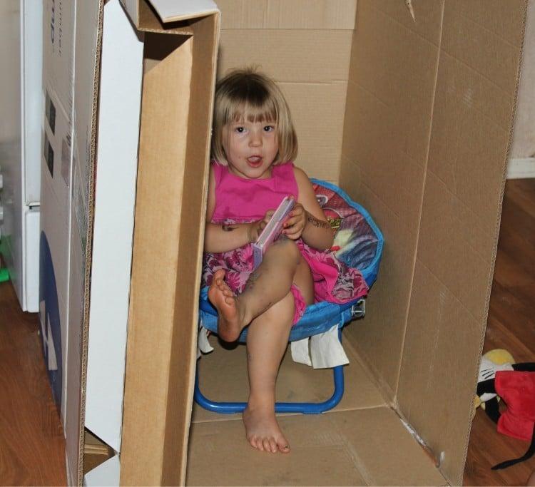 kids having fun with a box